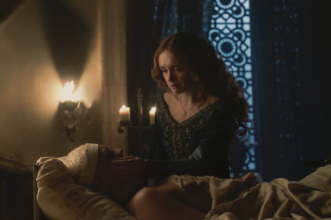 Alicent (Olivia Cooke) stands over Aegon's (Tom Glynn-Carney) body in a scene from House of the Dragon, season 2 episode 5