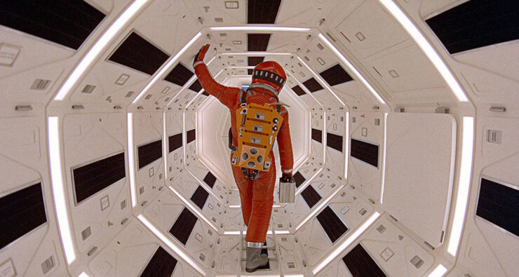 David Bowman (Keir Dullea) walks down an octagonal hallway of the Discovery One in a scene from 2001: A Space Odyssey