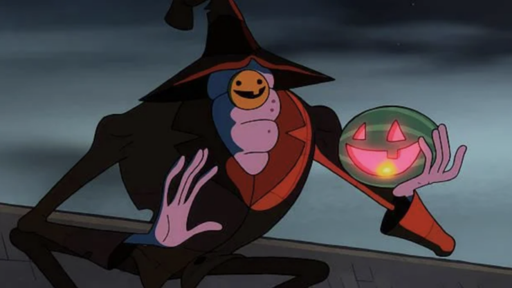 Image from Gravity Falls episode "Summerween": the Summerween Trickster holds a jack o'melon