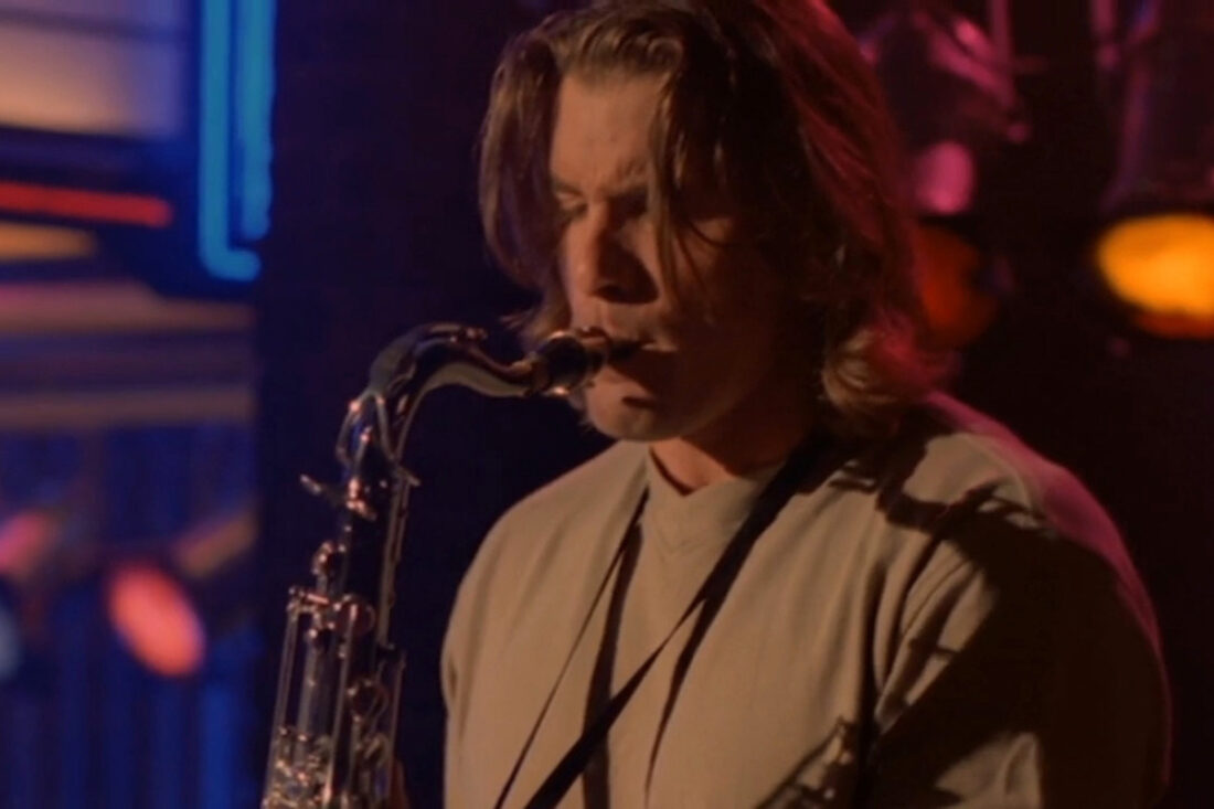 Johnny Domino (Matt McColm) plays the saxophone in a scene from Night Man