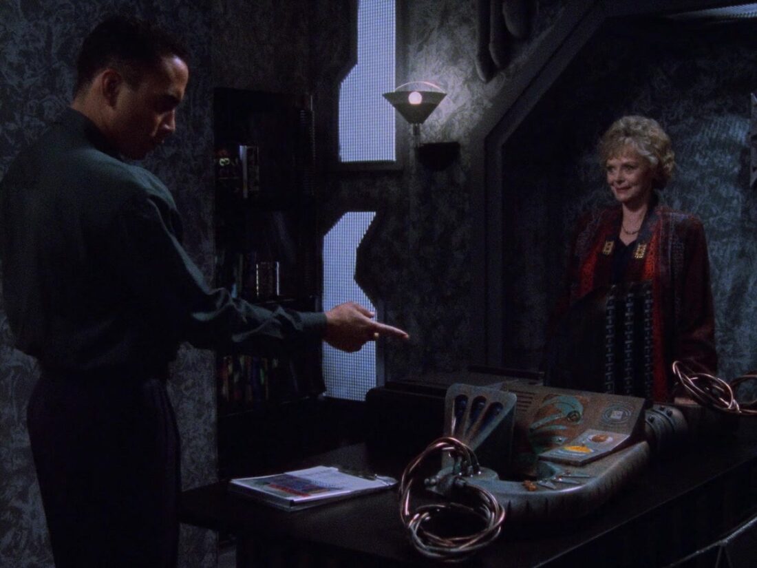 Dr Franklin examines Rosen's healing machine in a scene from Babylon 5 "The Quality of Mercy"