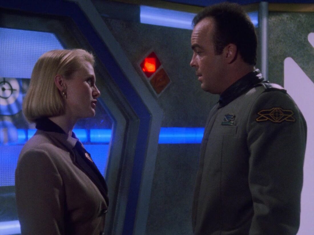 A scene from Babylon 5 "A Voice in the Wilderness, Part 1": Winters and Garibaldi in mid-conversation.