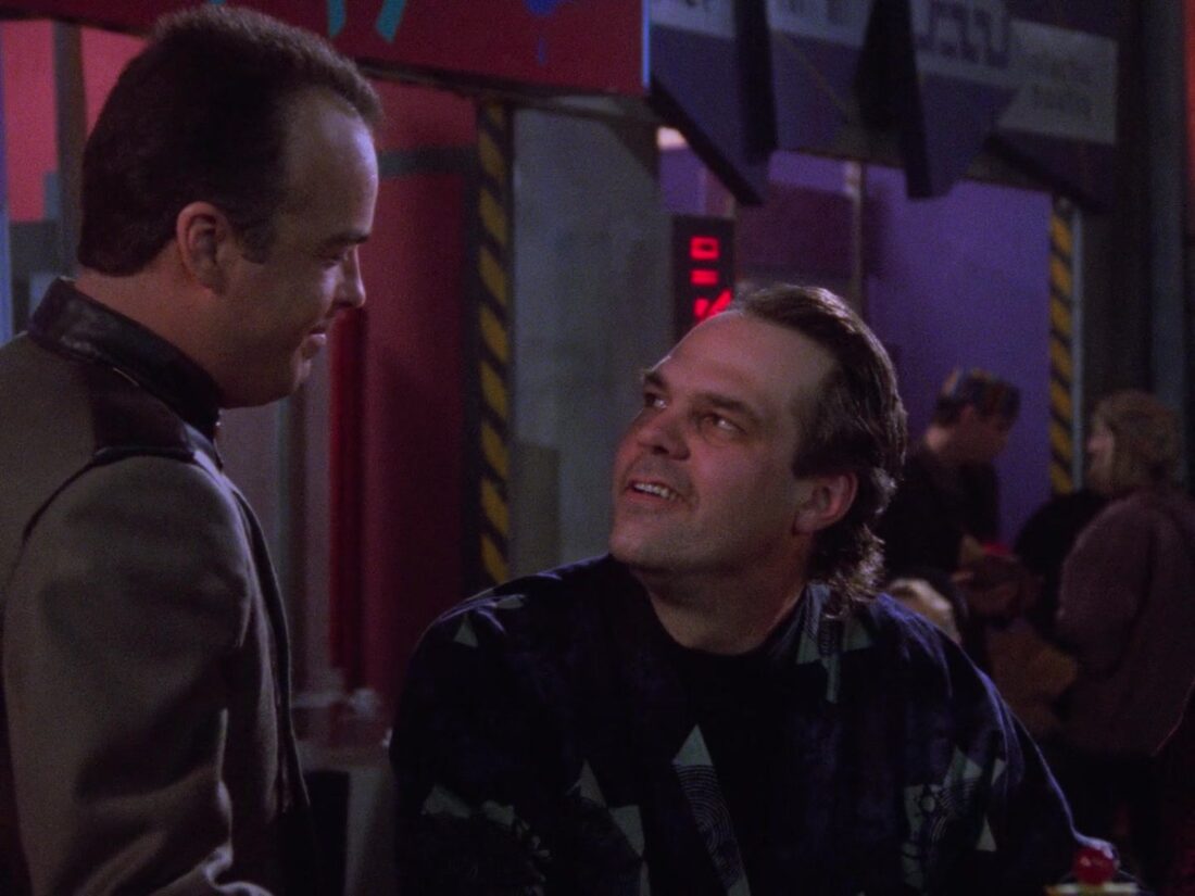 A scene from Babylon 5 "A Voice in the Wilderness, Part 2": Garibaldi confronts a man in the bar.