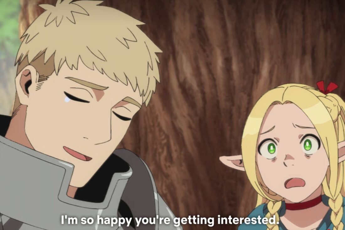 Laios and Marcille in a scene from Delicious in Dungeon. The caption reads "I'm so happy you're getting interested."