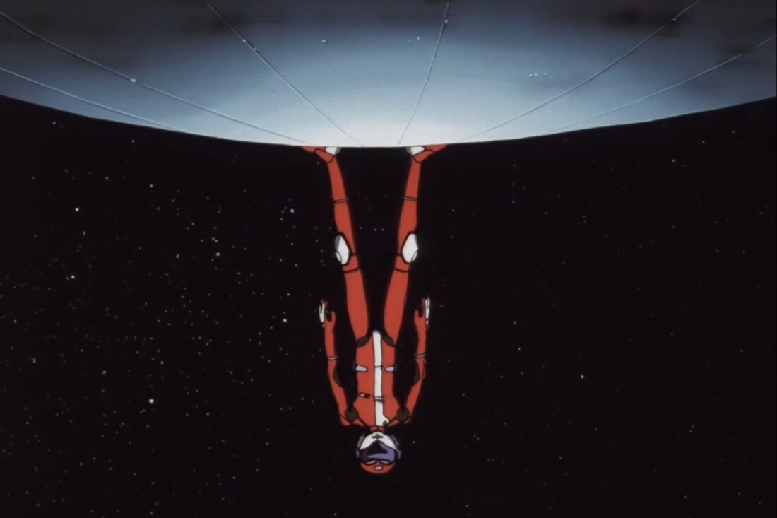 Image from the anime series Cowboy Bebop: Spike Speigel in a red space suit, standing upside down on the hull of a ship