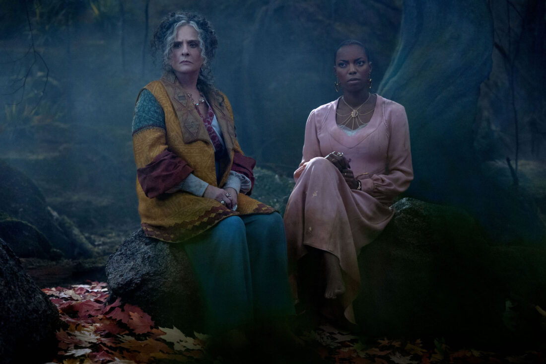 (L-R): Lilia Calderu (Patti LuPone) and Jennifer Kale ( Sasheer Zamata) looking worried on the road in Marvel Television's AGATHA ALL ALONG