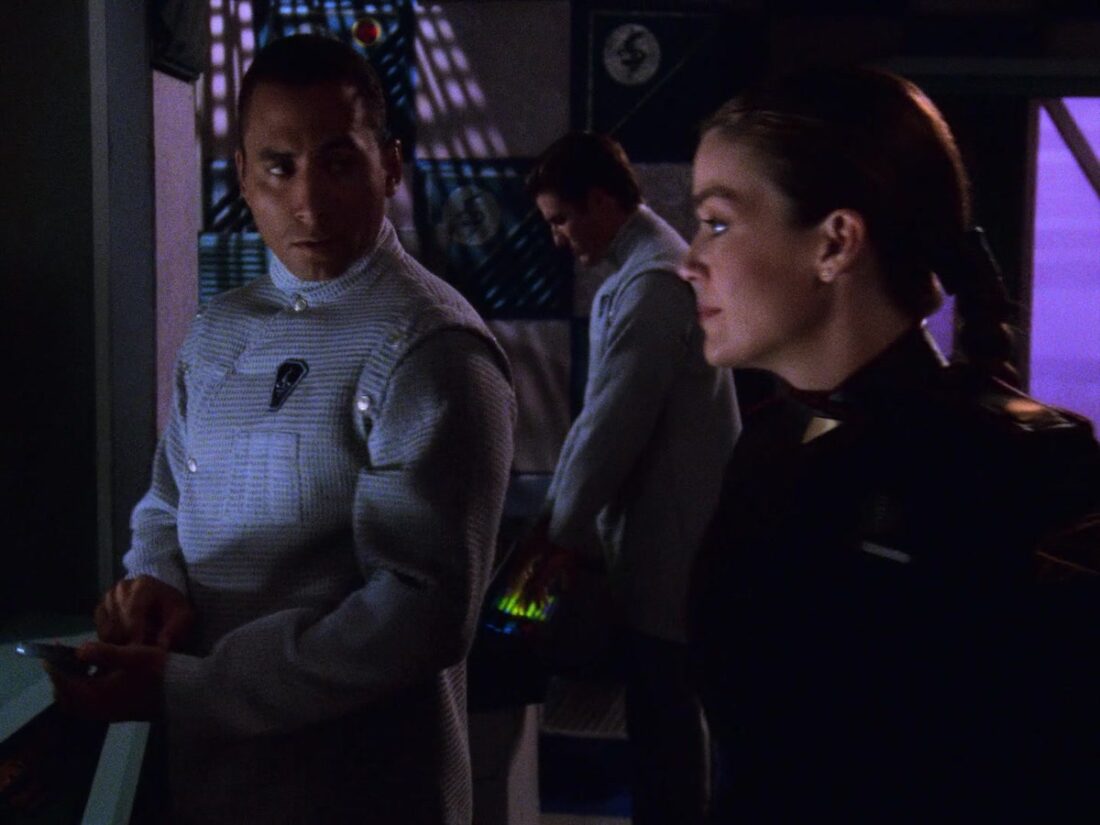 Scene from Babylon 5 "Points of Departure": Dr Franklin and Ivanova stand outside Garibaldi's sick bay