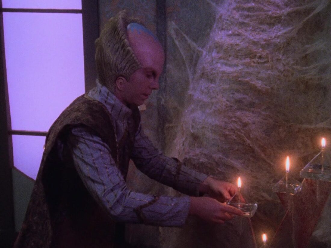 Scene from Babylon 5 "Points of Departure": Lennier places candles near Delenn's chrysalis