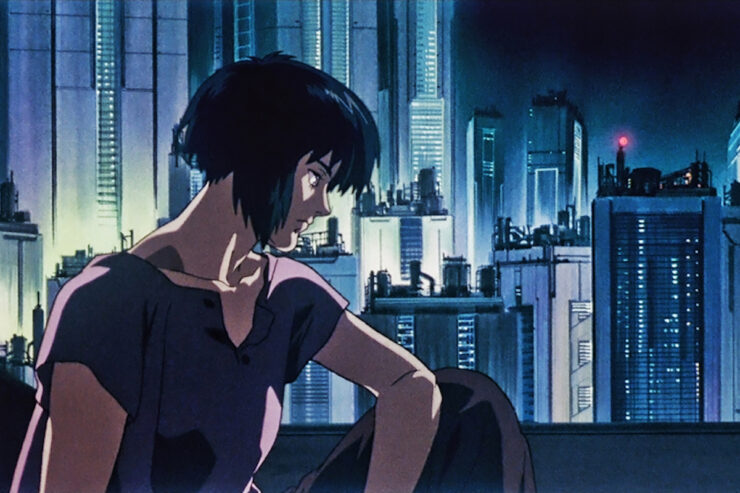 Image from Ghost in the Shell (1995): Major Motoko Kusanagi sits overlooking the city