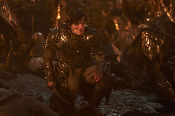 Robert Aramayo as Elrond on the battlefield in The RIngs of Power "Doomed to Die"