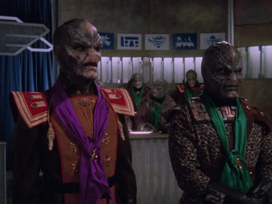 Aliens from two warring factions in a scene from Babylon 5, "The Geometry of Shadows"