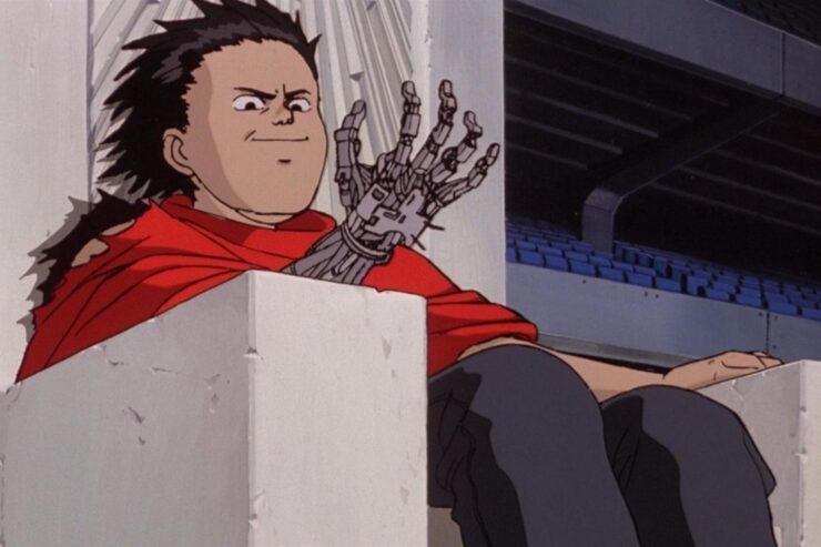 Tetsuo admires his robotic arm in a scene from Akira