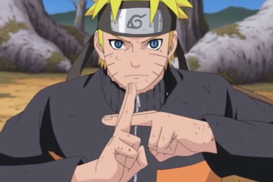 Naruto uses a hand seal in a scene from Naruto