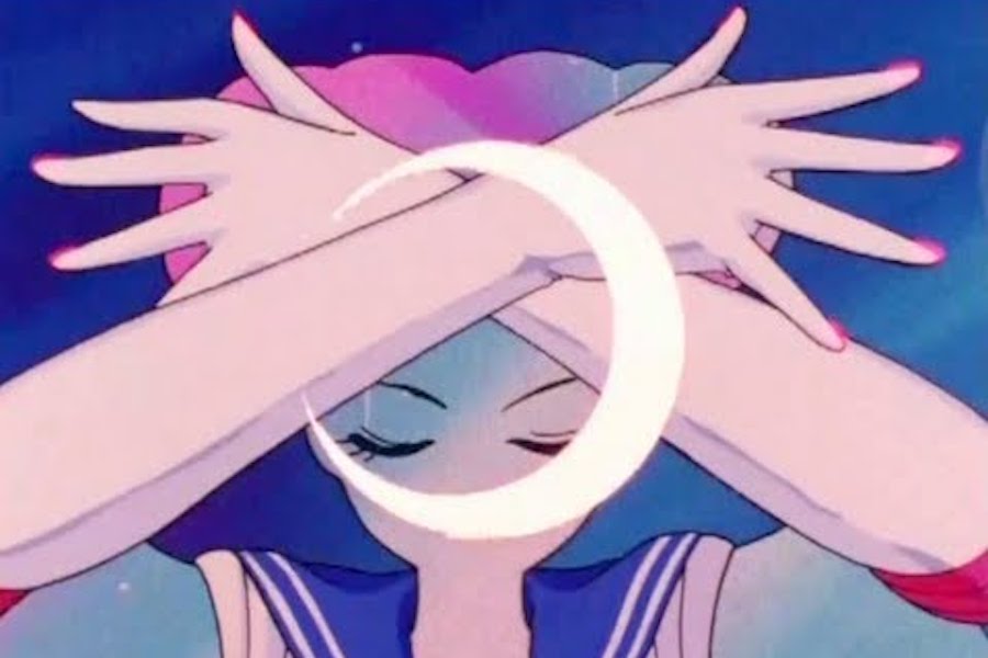 Close-up of Usagi's hands during the transformation sequence in Sailor Moon