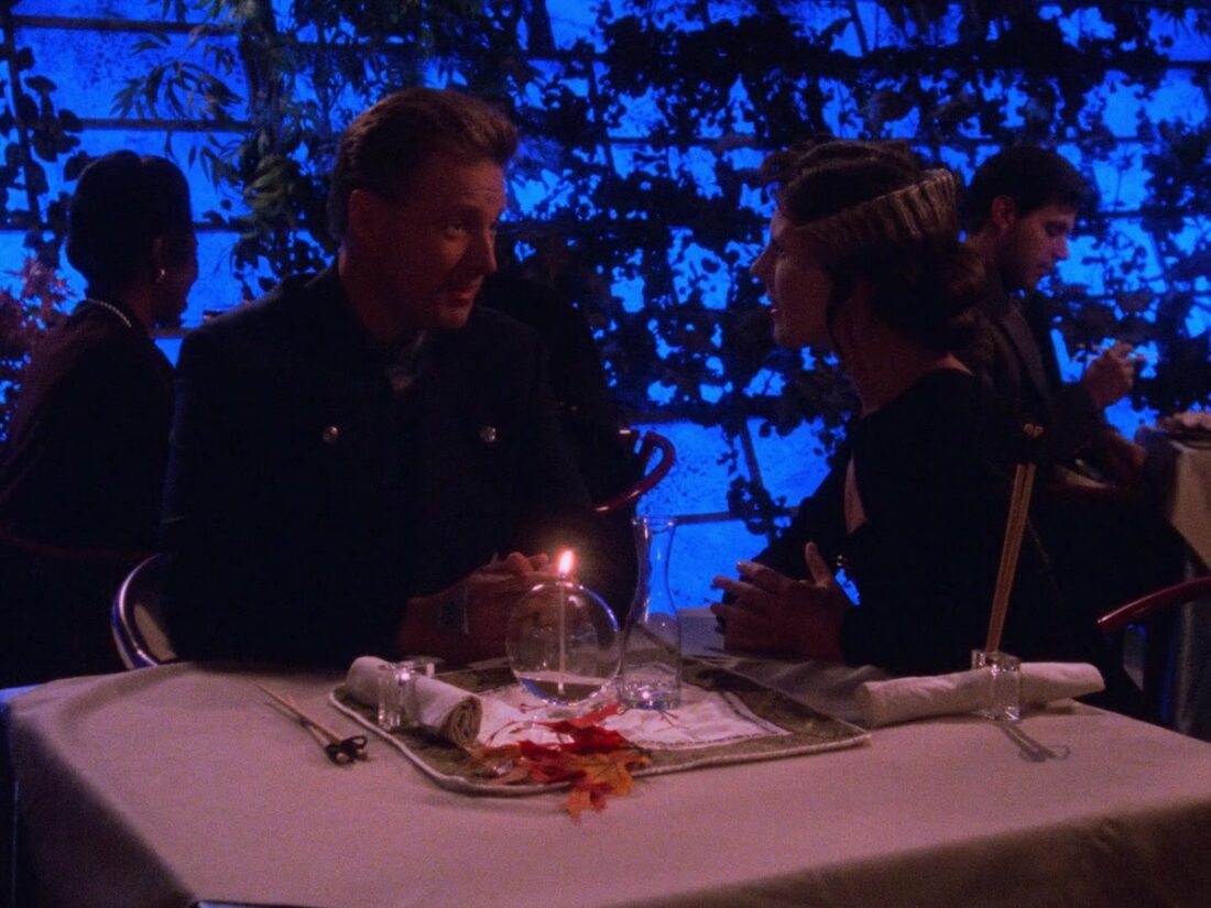 Sheridan and Delenn at dinner in a scene from Babylon 5 "A Race Through Dark Places"