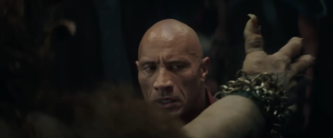 Cal (Dwayne Johnson) weighing the possibility that he's about to be slapped to death in Red One.