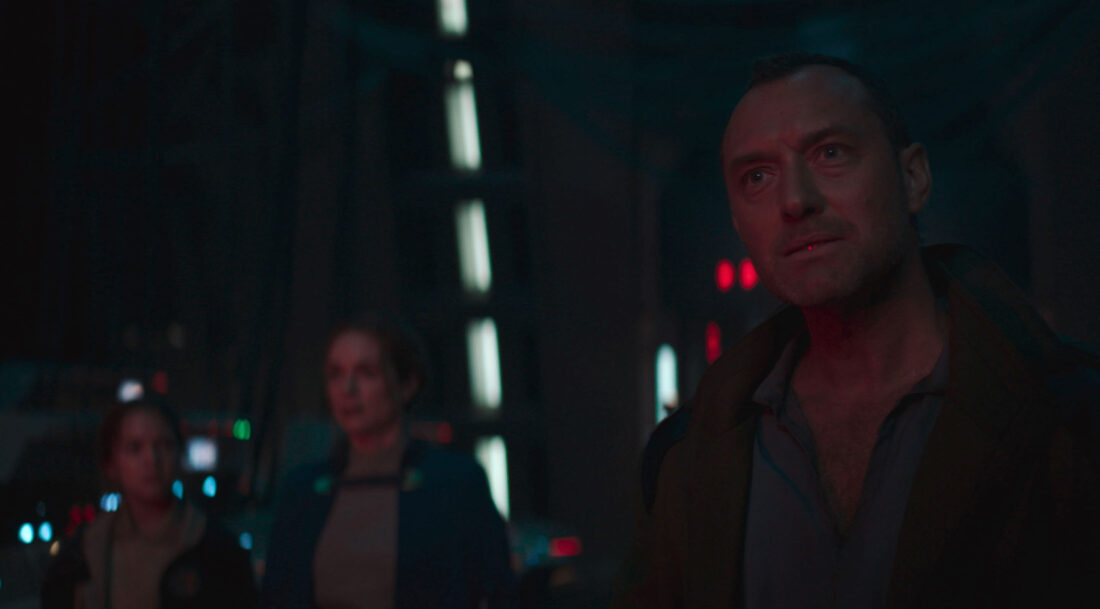 (L-R) Fern (Ryan Kiera Armstrong), Fara (Kerry Condon), and Jod (Jude Law) staring at the supervisor in Star Wars: Skeleton Crew finale "The Real Good Guys"