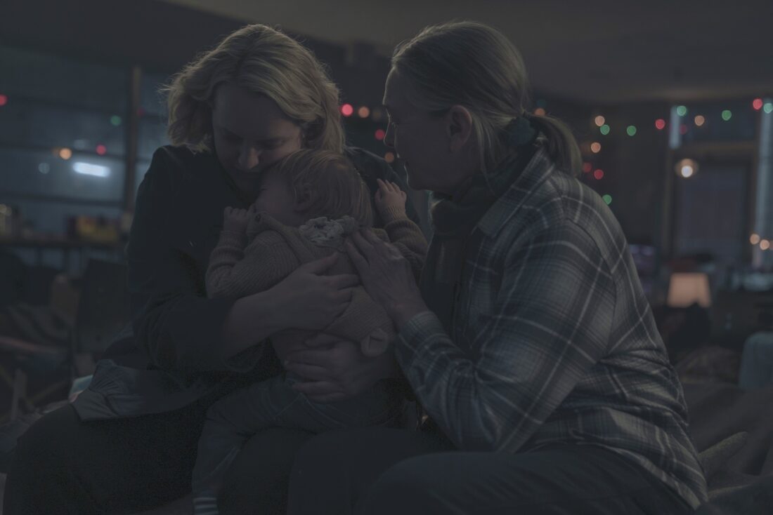 June holding baby Holly with her mother holding them in Handmaid's Tale series finale ELISABETH MOSS, CHERRY JONES