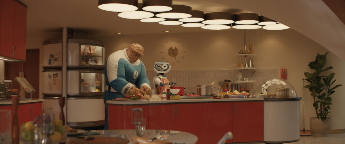 Ben Grimm and H.E.R.B.I.E. cooking in the kitchen in Fantastic Four: First Steps