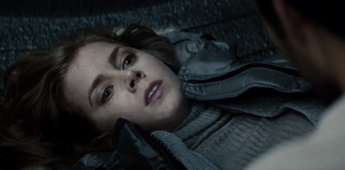 Lois on the ground, injured and frightened as Clark looms over her in Man of Steel