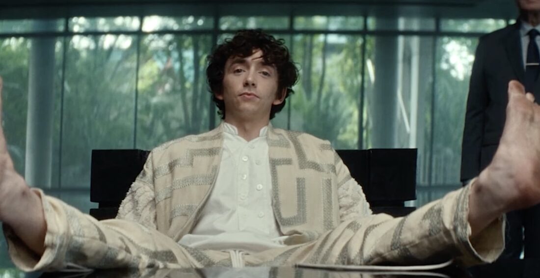 Boy Kavalie (Samuel Blenkin) puts his feet up on the table during a meeting with Yutani (Sandra Yi Sencindiver) in Noah Hawley's Alien: Earth.