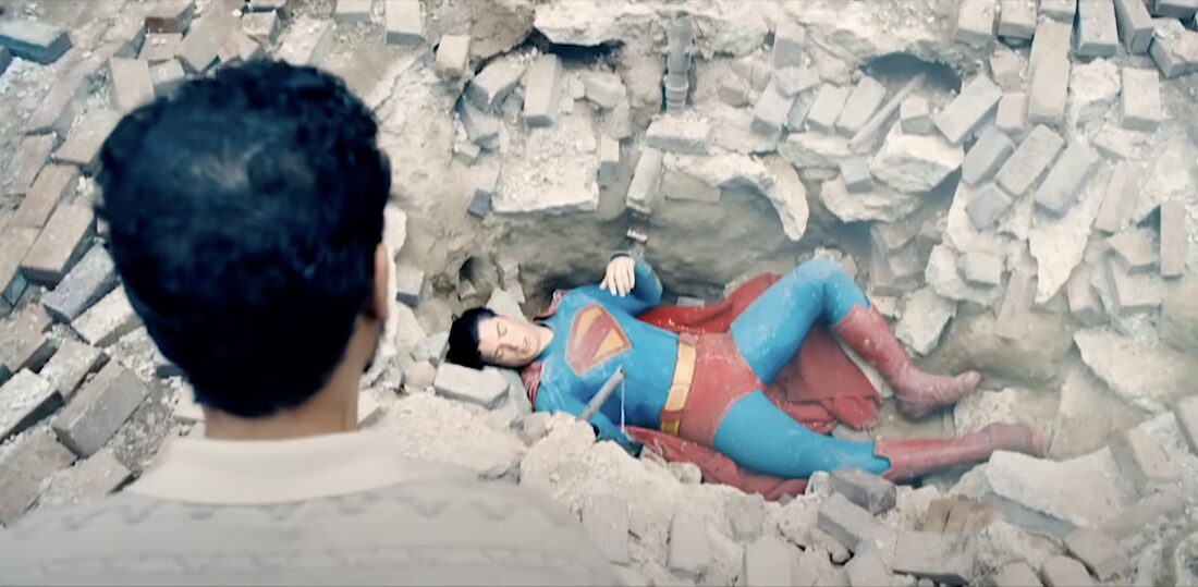 Superman (David Corenswet) is battered during a battle in James Gunn's Superman.
