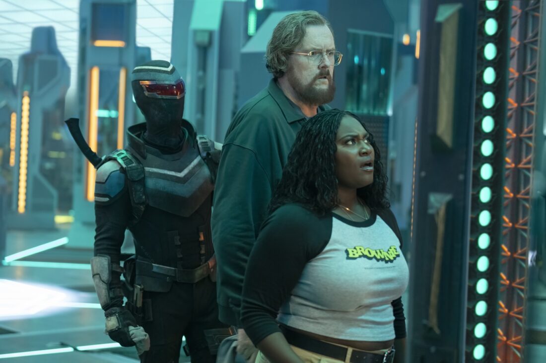 Vigilante, Economos, and Adebayo look at the alt-dimension door in Peacemaker's "Ignorance Is Chris"