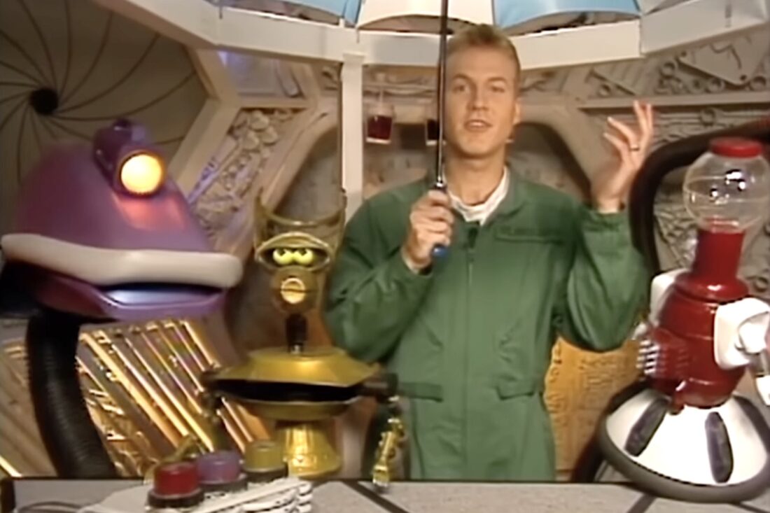 Mike Nelson and the 'bots Gypsy, Crow, and Tom Servo in Mystery Science Theater 3000 "The Brain That Wouldn't Die"