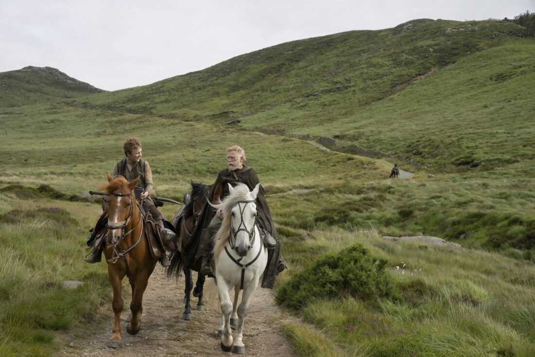 Young Dunk (Bamber Todd) and Sir Arlan of Pennytree (Danny Webb) travel on horseback in A Knight of the Seven Kingdoms