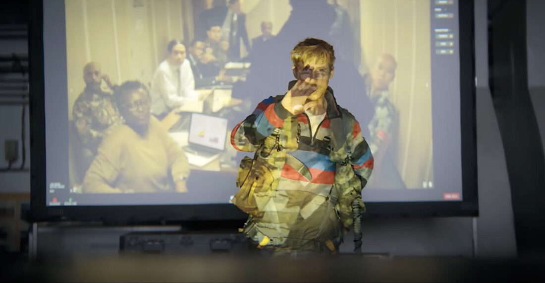 Ryland Grace (Ryan Gosling) addresses the greatest scientists in the world in Project Hail Mary