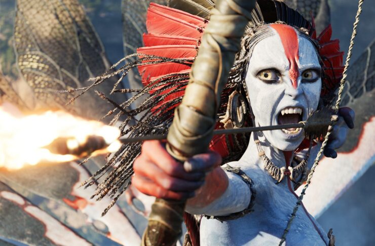A Na'vi screaming about to fire a flaming arrow in Avatar: Fire and Ash