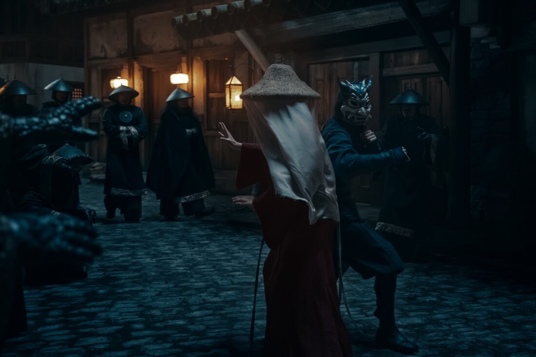 Avatar: The Last Airbender. (L to R) Kiawentiio Tarbell as Katara, Dallas Liu as Zuko fighting side by side as the Painted Lady and Blue Spirit in season 2 of Avatar: The Last Airbender