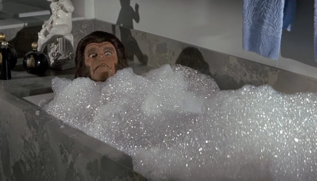 Dr. Zira in a bubble bath, eyes wide in Escape From the Planet of the Apes