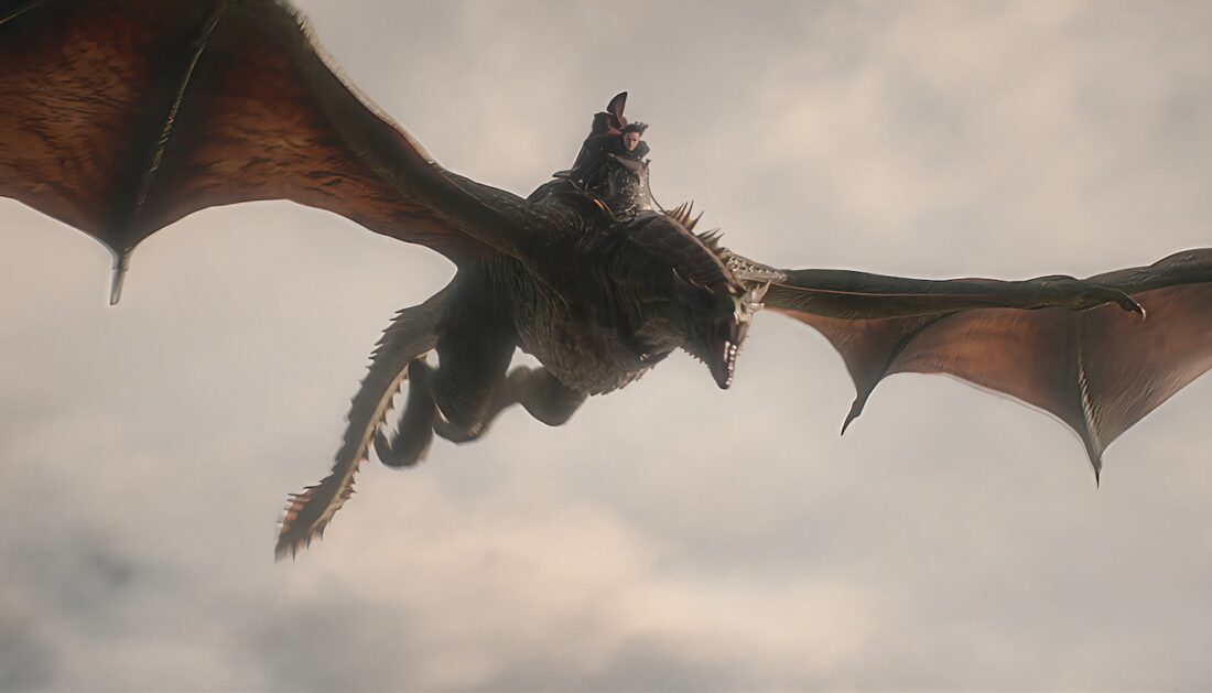 Prince Jacaerys (Harry Collett) rides the dragon Vermax into battle in a scene from House of the Dragon