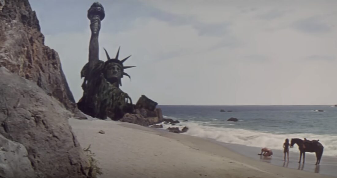 the statue of liberty jutting out of the ground at the end of Planet of the Apes