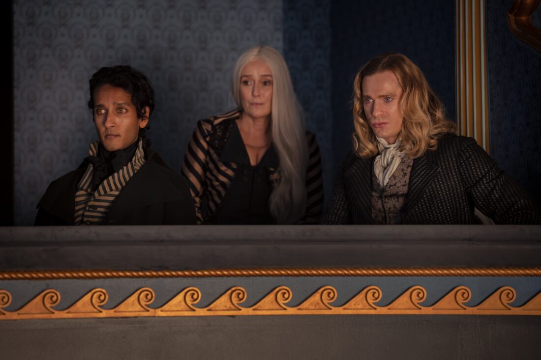 Sam Reid as Lestat De Lioncourt, Assad Zaman as Armand, Jennifer Ehle as Gabriella all watching the theatre de vampires - Anne Rice's The Vampire Lestat, Episode 03