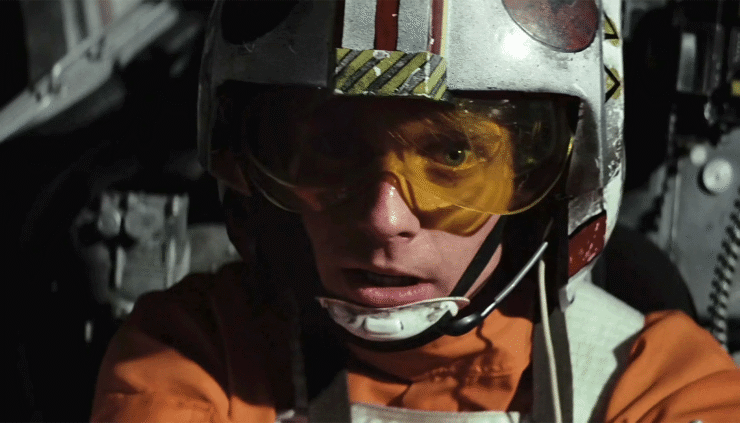Luke Skywalker (Mark Hamill) piloting an X-Wing in a scene from Star Wars: A New Hope