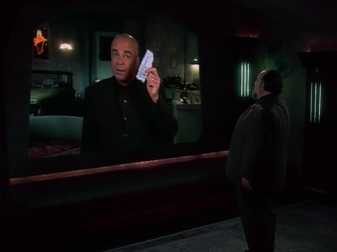 Screenshot from Babylon 5 "Objects in Motion": Garibaldi contacts the Edgars Industries board